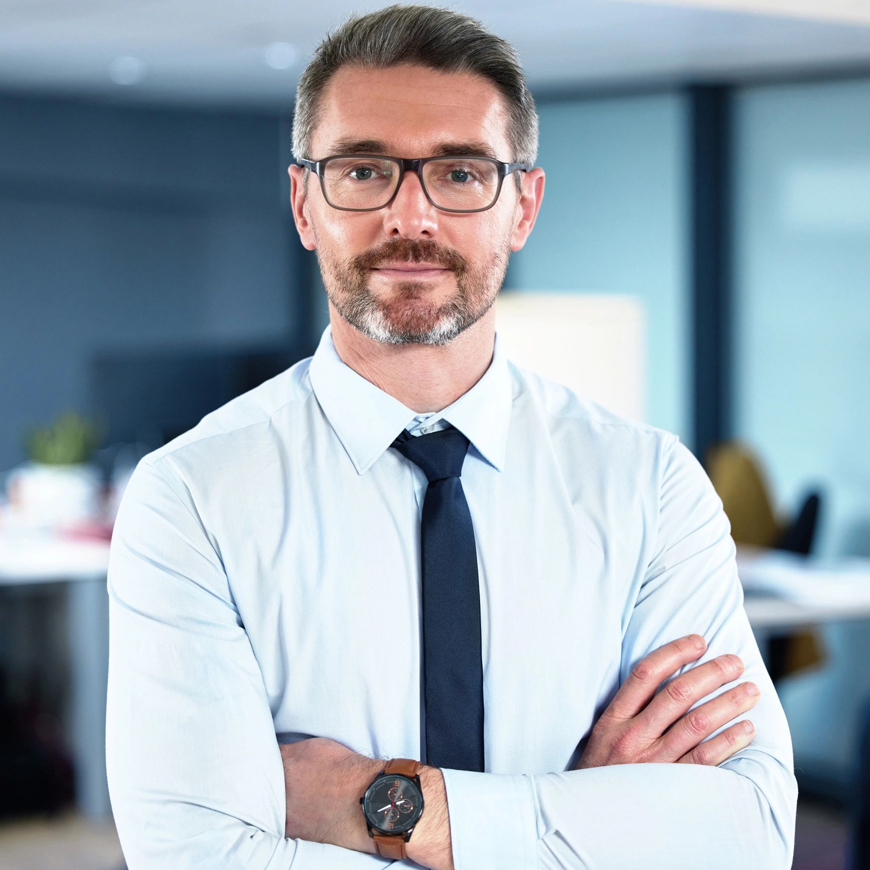 Professional headshot of a business leader