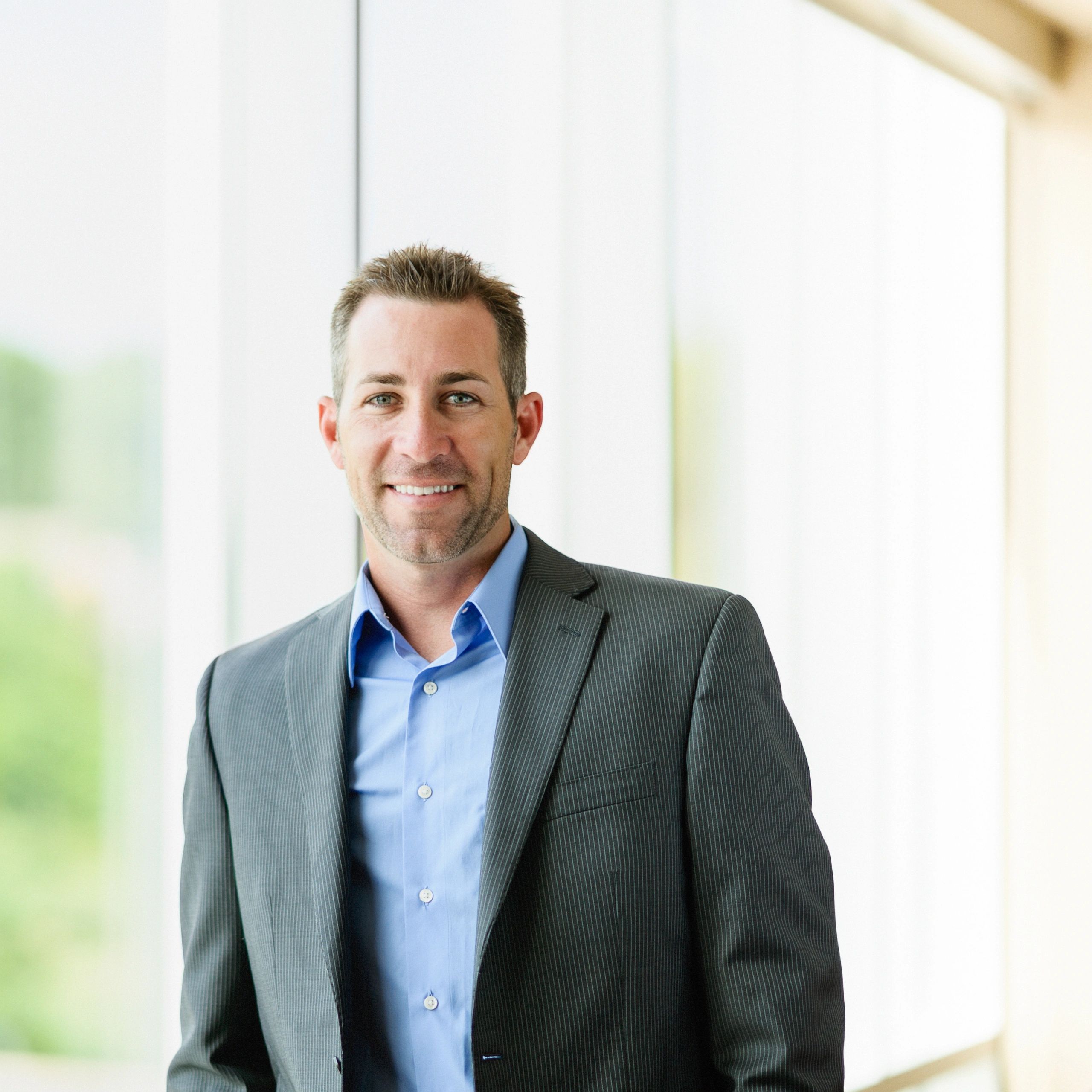 Professional headshot representing operations leadership