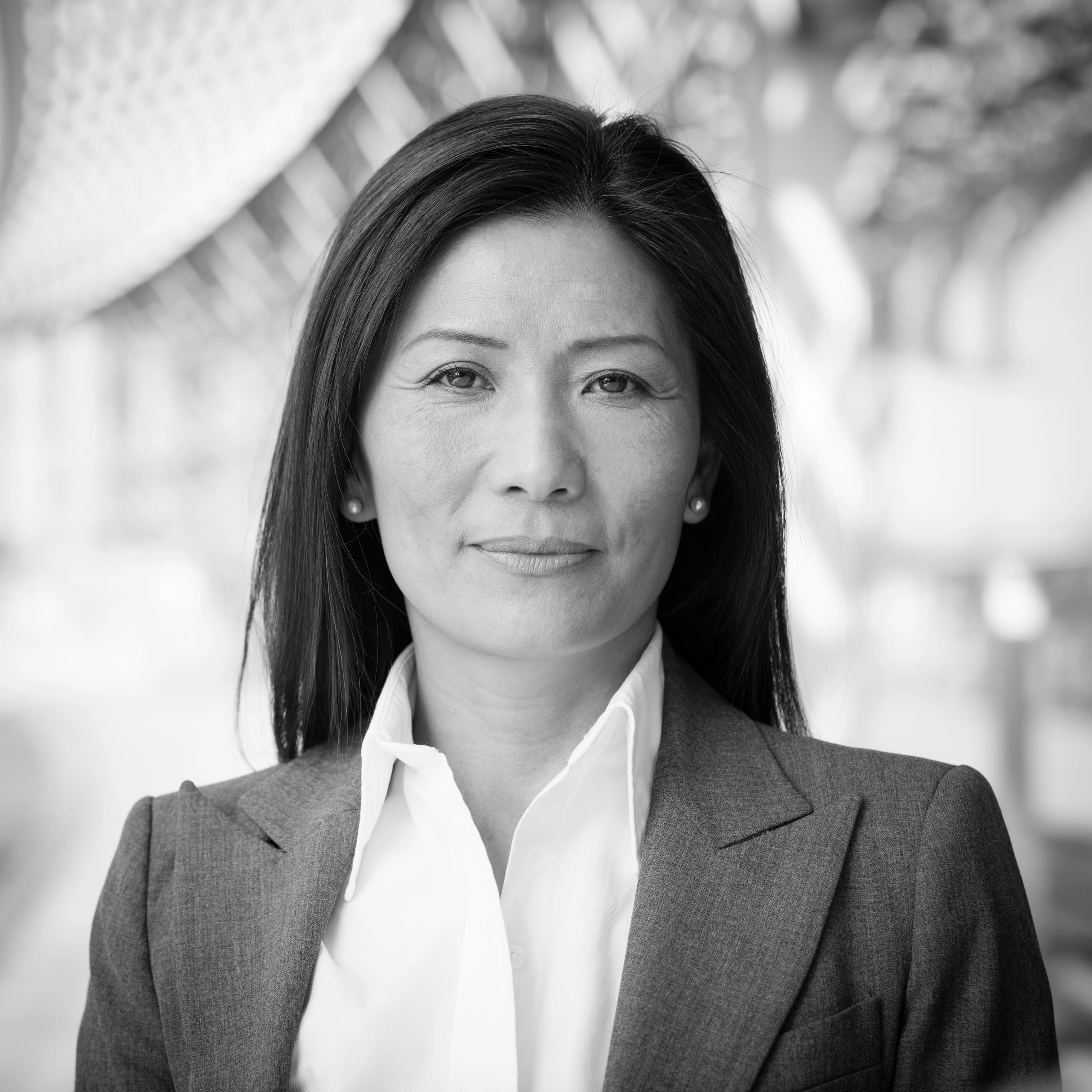 Professional headshot representing a client liaison