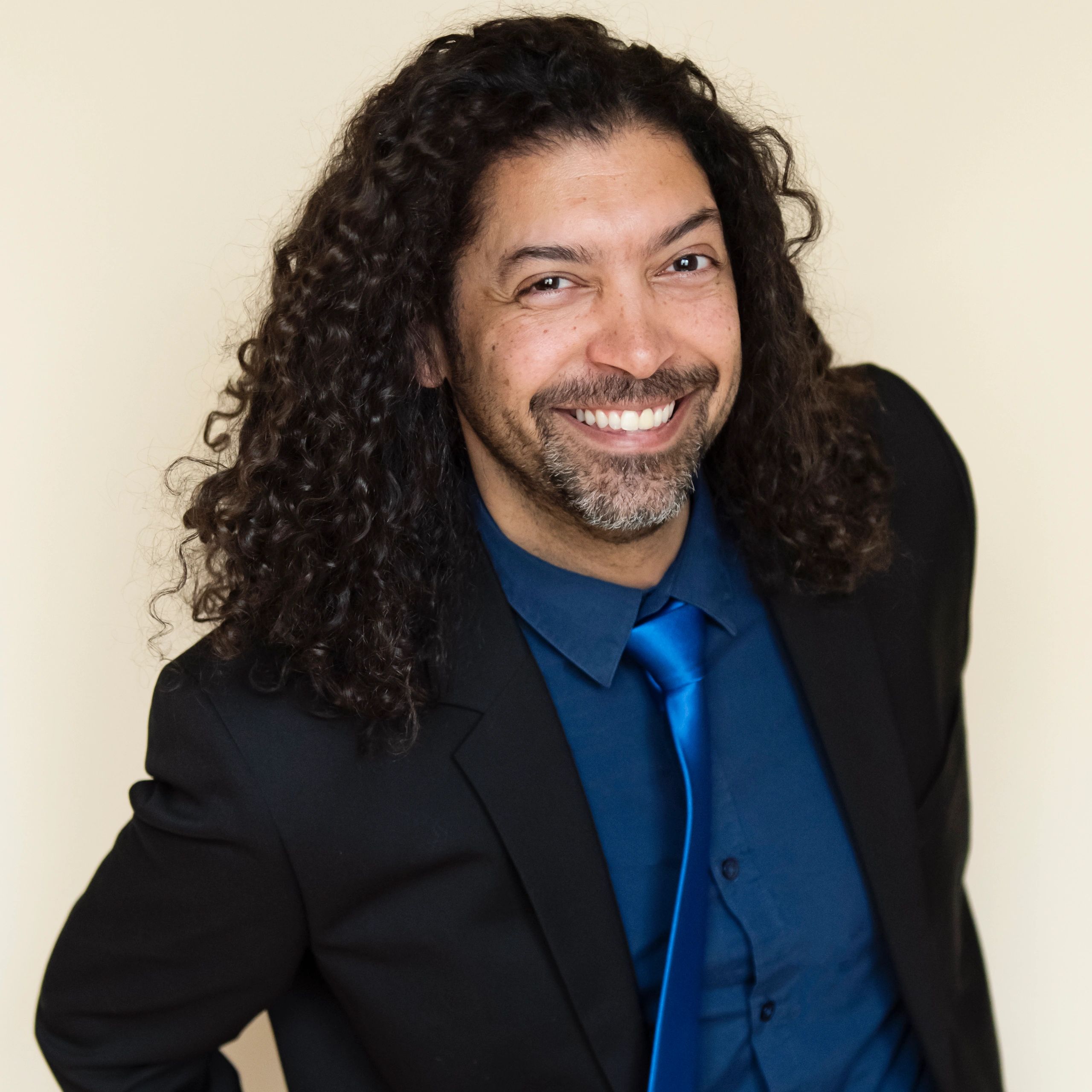 Professional headshot representing a security supervisor